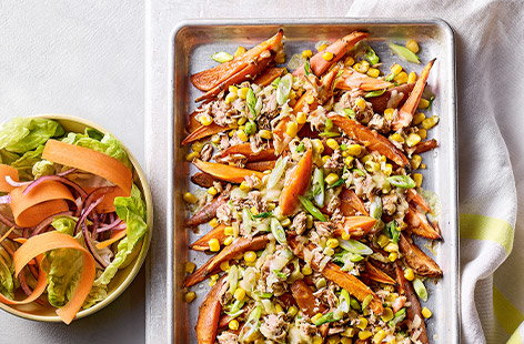 Enjoy all the flavours of a cheesy tuna melt in this tasty traybake with sweet potato wedges. It's sure to be a hit with all the family!