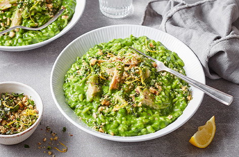 This risotto is packed with fresh spring flavours. The pea pureé turns it a vibrant green and chicken-style pieces give it great texture. Top with herby gremolata for a delicious meal