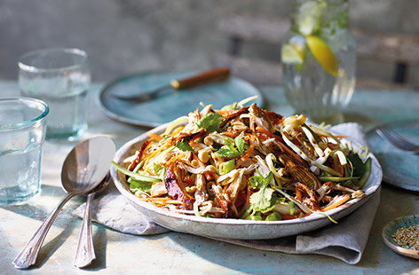 Looking for a new healthy lunch idea to keep you going this summer? This chopped Asian chicken salad recipe is perfect for throwing together at home or taking to work. Sticky teriyaki-style chicken is tossed with a veg slaw for lunch in under 30 minutes. 