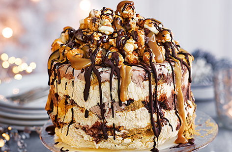 Guests' mouths will be watering at the mere sight of this ice cream show-stopper. Gingerbread crumbs are sandwiched between melty layers of chocolate and spiced vanilla ice cream, finished off with toffee popcorn and oozy salted caramel.